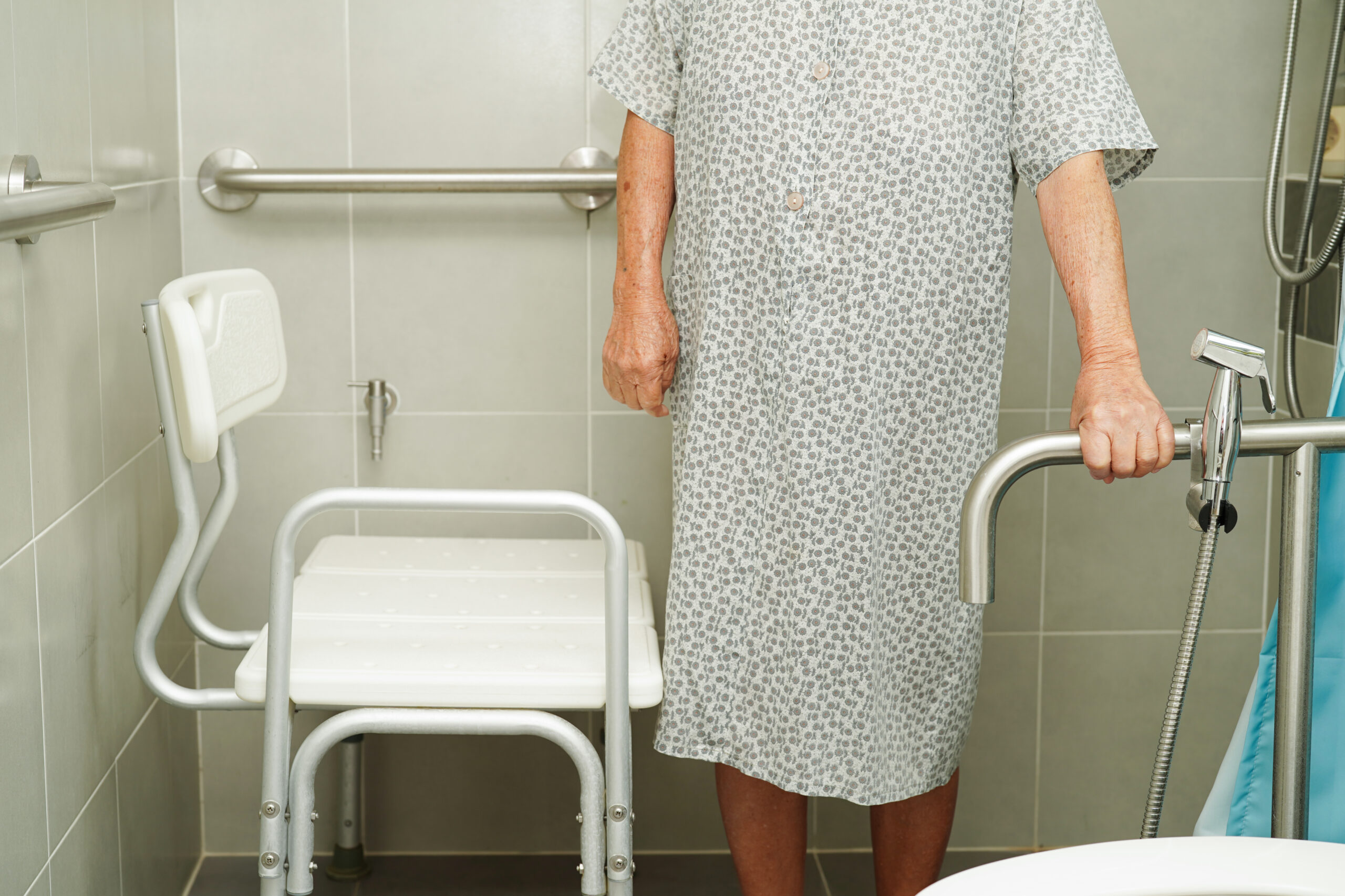 asian elderly old woman patient use toilet support rail bathroom handrail safety grab bar security nursing hospital scaled