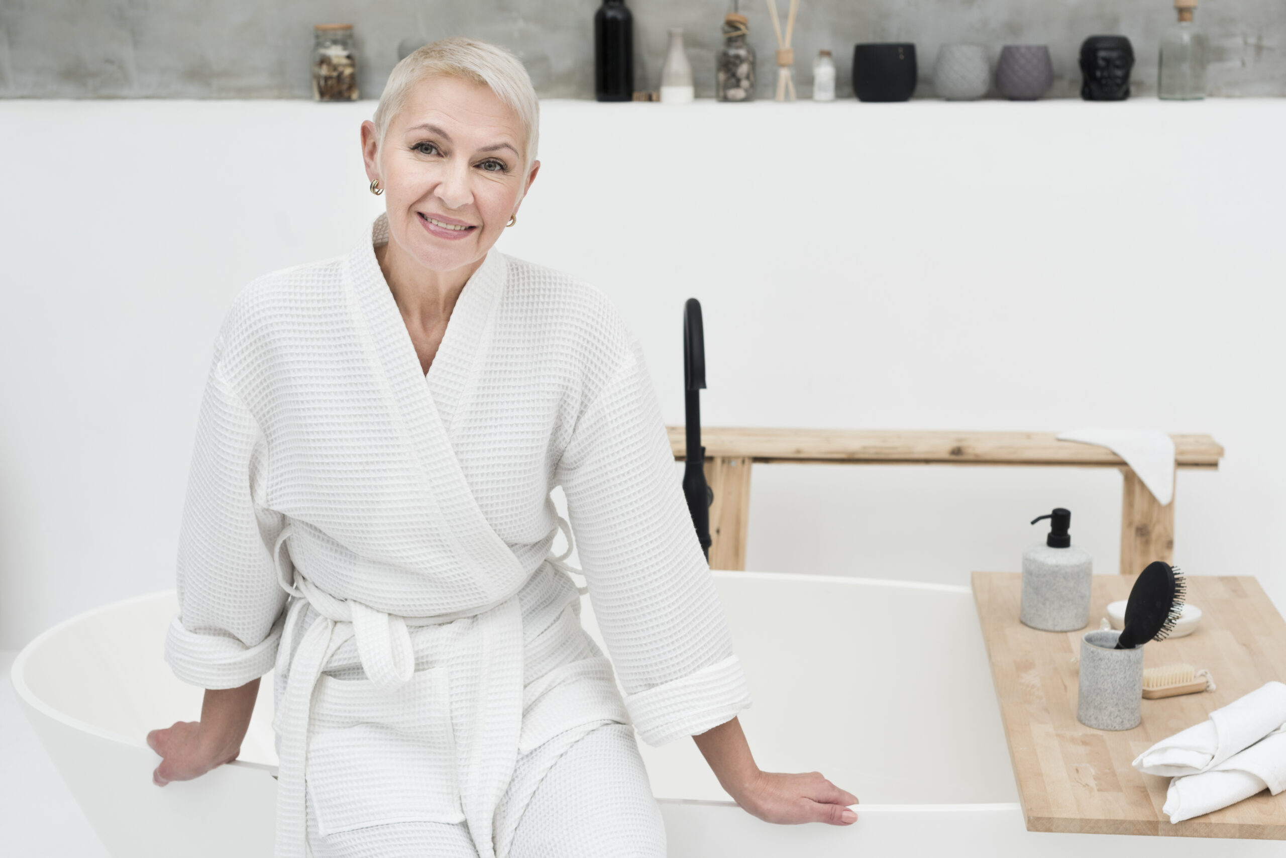 elder woman smiling posing bathrobe scaled